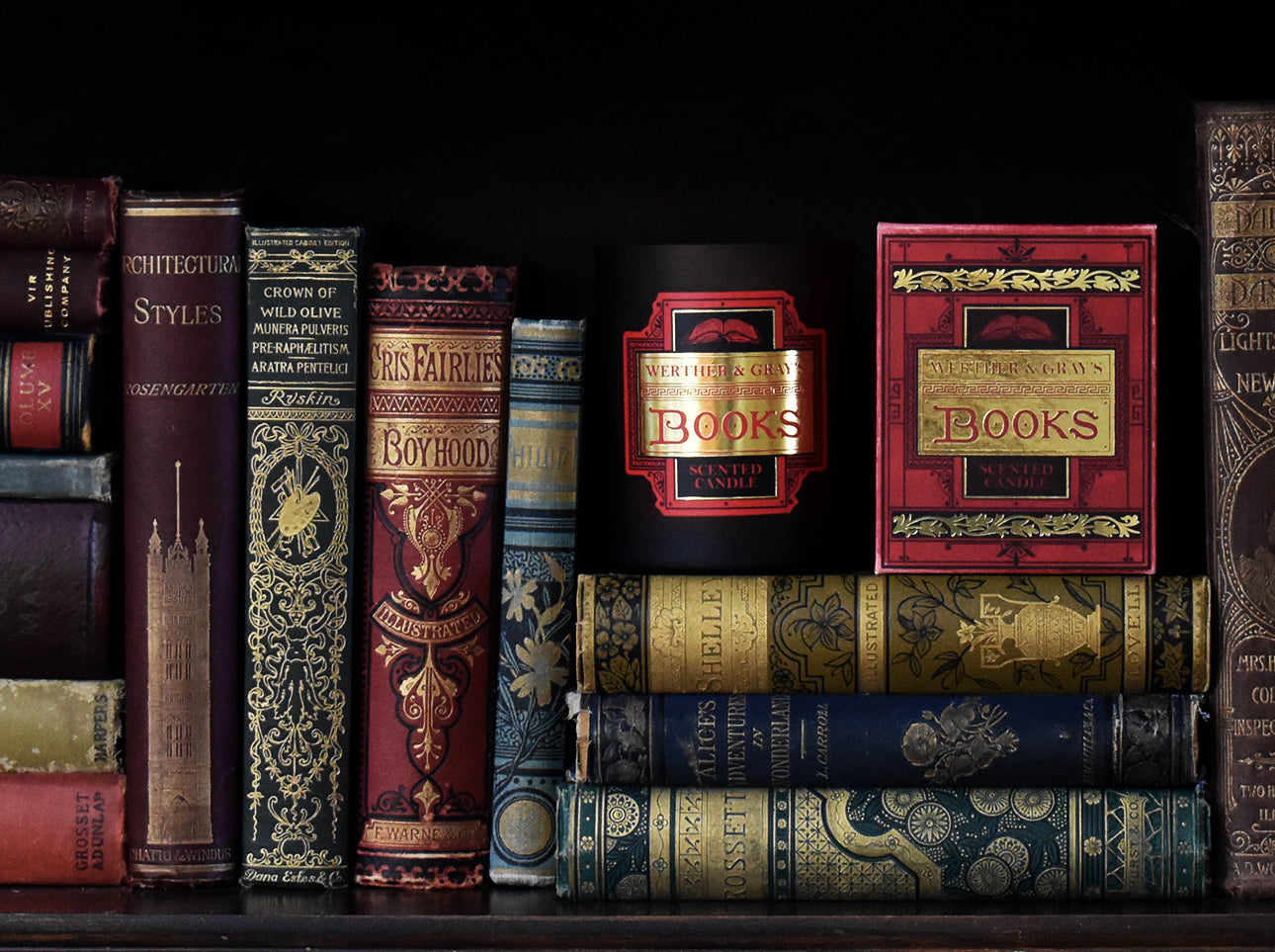 Books scented candle, with antique books on a shelf